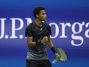 Canada's Felix Auger-Aliassime reacts during his win over Carlos Alcaraz of Spain on Tuesday.