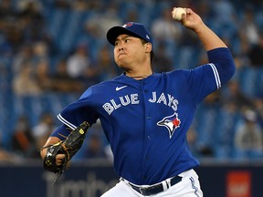 Toronto Blue Jays starting pitcher Hyun Jin Ryu (99) throws against the Minnesota Twins at Rogers Centre.