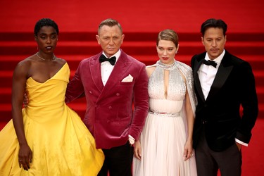 Cast members Lashana Lynch, Daniel Craig, Lea Seydoux and director Cary Fukunaga pose during the world premiere of the new James Bond film "No Time To Die" at the Royal Albert Hall in London, England, Tuesday, Sept. 28, 2021.