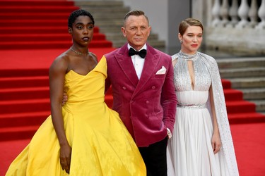 Cast members Lashana Lynch, Daniel Craig and Lea Seydoux pose during the world premiere of the new James Bond film "No Time To Die" at the Royal Albert Hall in London, England, Tuesday, Sept. 28, 2021.