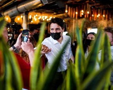 Prime Minister Justin Trudeau greets supporters during an election campaign stop at The Picaroons Roundhouse in Fredericton, New Brunswick, September 15, 2021.