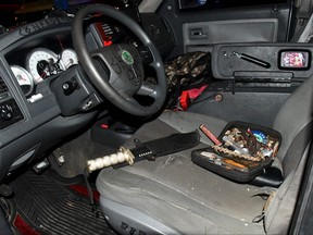 This handout photo released on Sept. 13, 2021 courtesy of the U.S. Capitol Police shows the inside of a Dodge Dakota pickup truck after U.S. Capitol Police officers arrested a California man with a bayonet and machete in his vehicle in Washington, D.C.