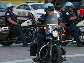 Capitol police on motorcycles sit outside the United States Capitol building in Washington, September 14, 2021