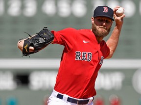 Boston Red Sox starting pitcher Chris Sale pitches against the Tampa Bay Rays at Fenway Park.