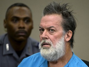 Robert Lewis Dear, accused of shooting three people to death and wounding nine others at a Planned Parenthood clinic in Colorado, attends a hearing in Colorado Springs, Colorado, December 9, 2015.