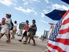 New York City police found a decomposed body under the boardwalk in Coney Island, they said.