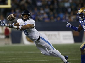 Argonauts' Eric Rogers, making a diving catch against the Winnipeg Blue Bombers on August 13, 2021, might be activated to play in Hamilton on Monday afternoon after sustaining a concussion.