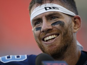 Argonauts quarterback Nick Arbuckle smiles during an interview after beating the Bombers in his starting debut at BMO Field in Toronto, Saturday, Aug. 21, 2021.