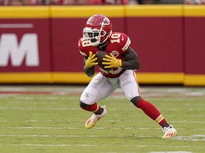 Kansas City Chiefs wide receiver Tyreek Hill reverses his field en route to a 75-yard touchdown pass during the second half of an NFL football game against the Cleveland Browns Sunday, Sept. 12, 2021, in Kansas City, Mo.