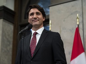 Prime Minister Justin Trudeau takes questions after announcing that Canadians Michael Spavor and Michael Kovrig have been released from detention in China, on Parliament Hill in Ottawa, Sept. 24, 2021.