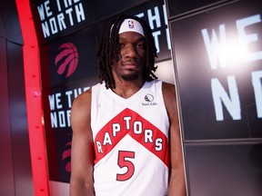 Toronto Raptors' Precious Achiuwa poses for a photograph at Scotiabank Arena during the NBA basketball team's media day in Toronto, Monday, Sept. 27, 2021.