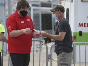 Fans attending the Toronto Argonauts versus Hamilton Tiger-Cats Labour Day Classic at Tim Horton's Field in Hamilton had to present proof of vaccination on Sept. 6, 2021.