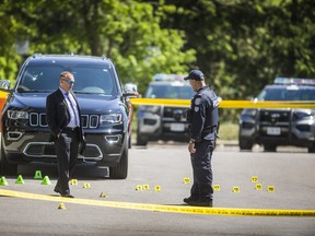 Toronto Police investigate a Saturday night shooting that left a 42-year-old Toronto man dead, and two injured on Martha Eaton Way in the Black Creek Dr. and Trethewey Dr. area n Toronto, Ont. on Sunday, Aug. 15, 2021.