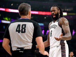 DeAndre Jordan of the Brooklyn Nets argues a call with referee Scott Foster against the Los Angeles Lakers at Staples Center on March 10, 2020 in Los Angeles.
