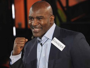 Evander Holyfield enters the Celebrity Big Brother House at Elstree Studios on January 3, 2014 in Borehamwood, England.