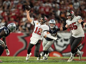 Tampa Bay Buccaneers quarterback Tom Brady (12) throws the ball against the Dallas Cowboys in the fourth quarter at Raymond James Stadium Sept. 9, 2021.