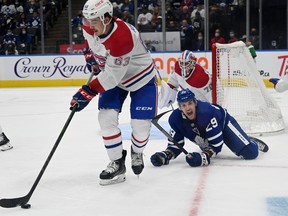 Maple Leafs forward Kurtis Gabriel (back) yells at the referee that he had been tripped by Montreal Canadiens’ Arber Xhekaj during pre-season action on Saturday night.