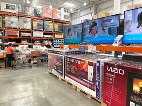 Televisions are displayed at a Costco store on July 13, 2021.