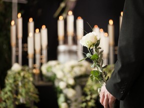 A man at a funeral.