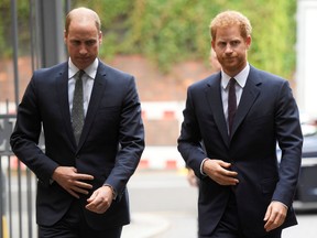 Prince William, Duke of Cambridge and Prince Harry arrive during a visit to the newly established Royal Foundation Support4Grenfell community hub on September 5, 2017 in London, England.