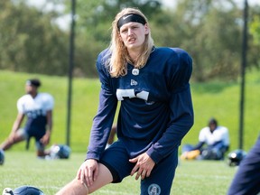 Rookie defensive back Josh Hagerty, doing his stretches at practice, has been a real find for the Argos since taking over for injured Crezdon Butler.