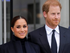 Prince Harry and Meghan, Duke and Duchess of Sussex, look on while visiting One World Trade Center in Manhattan, New York City, Sept. 23, 2021.