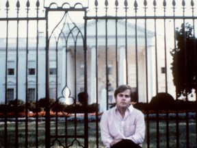 In this file photo taken on March 1, 1981 a picture taken in front of the White House of John Hinckley who attempted to assassinate U.S. President Ronald Reagan in Washington, D.C., on March 30, 1981, as the culmination of an effort to impress actress Jodie Foster.