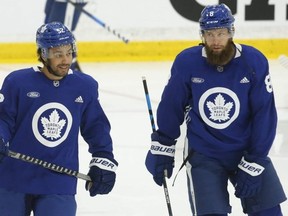 Toronto Maple Leafs Jake Muzzin (right) with newcomer Josh Ho-Sang on the first day of on ice activity at training camp in Toronto on Thursday. Jack Boland/Toronto Sun