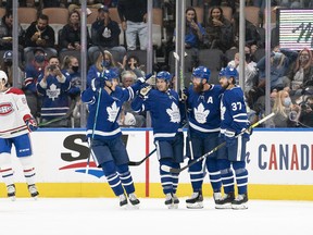 Maple Leafs defenceman Jake Muzzin (8) celebrates scoring a goal in pre-season action against the Montreal Canadiens on Saturday night at Scotiabank Arena. Fans were back in the stands for the first time since March 10, 2020 in a win over Tampa Bay.