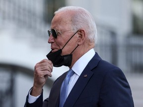 U.S. President Joe Biden speaks to reporters before he departs the White House for the weekend to Camp David, in Washington, D.C., Friday, Sept. 24, 2021.
