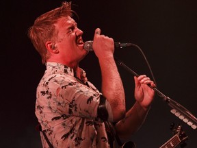 Josh Homme of Queens of the Stone Age performs on stage at Rogers Place in Edmonton, May 18, 2018.
