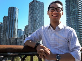 ELEC PIC – Ward 10 council candidate Kevin Vuong on the Bathurst Bridge overlooking Toronto, Ont. on Friday September 28, 2018. Dave Abel/Toronto Sun/Postmedia Network