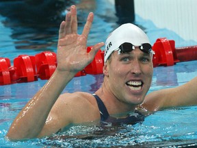 In this file photo taken on August 12, 2008 swimmer Klete Keller smiles after winning the men's 4 x 200m freestyle relay heat at the National Aquatics Center in the 2008 Beijing Olympic Games. 

Keller, 39, admitted in a plea agreement to breaching the US Capitol to try to obstruct the certification of Democrat Joe Biden's November presidential election victory. (Photo by Greg WOOD / AFP) (Photo by GREG WOOD/AFP via Getty Images)