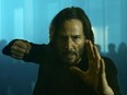 Keanu Reeves returns as Neo in The Matrix Resurrections.