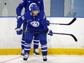 Toronto Maple Leafs captain John Tavares takes a breather at training camp in Toronto on Thursday September 23, 2021.