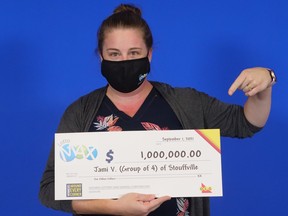 Jami Lynn Viveiros of Stouffville collects $1 million cheque on behalf of herself and three friends