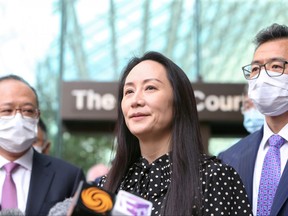 Huawei Technologies Chief Financial Officer Meng Wanzhou speaks to media outside the B.C. Supreme Court following a hearing about her release in Vancouver, Sept. 24, 2021.