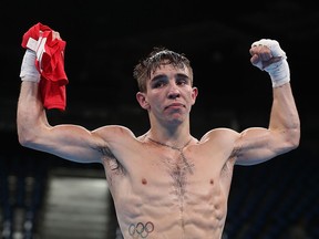 Michael Conlan of Ireland gestures to the crowd after his loss to Vladimir Nikitin of Russia at the Rio Olympic Games at Riocentro on August 16, 2016 in Rio de Janeiro, Brazil.