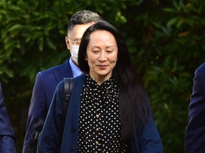 Huawei CFO Meng Wanzhou leaves her Vancouver home to attend her extradition hearing on Friday, Sept. 24, 2021.