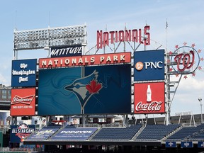 The Toronto Blue Jays logo is displayed on the video board during batting practice before a  game against the Washington Nationals at Nationals Park on July 30, 2020.