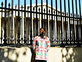 Nigerian artist Osarobo Zeickner-Okoro, who offered to donate new artworks created in Benin City, Nigeria, to the British Museum poses for a photograph outside its building in London September 16, 2021.
