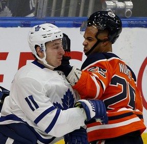 Oilers defenceman Darnell Nurse, right, is glad he won’t have to play against Zach Hyman anymore. LARRY WONG/POSTMEDIA FILES