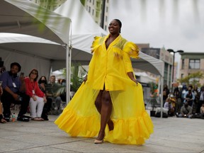 A model presents a creation from House of Vaughn at Harlem Fashion Week in Manhattan, Sept. 5, 2021.