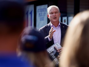 Conservative party leader Erin O'Toole speaks during a stop at a constituency office during his election campaign tour in Brantford, Ont., Sept. 17, 2021.