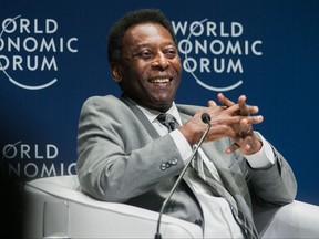 In this handout file photo released by WEF and taken on March 14, 2018, Brazilian football legend Pele smiles during the opening plenary at the World Economic Forum on Latin America 2018 in Sao Paulo, Brazil.