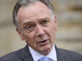 CP-Web. Conservative MP Peter Kent speaks to reporters on Parliament Hill in Ottawa on Wednesday, July 22, 2020. The Liberal and Conservative parties say they’ll no longer use the federal government’s wage-subsidy program. THE CANADIAN PRESS/Sean Kilpatrick ORG XMIT: RJB106