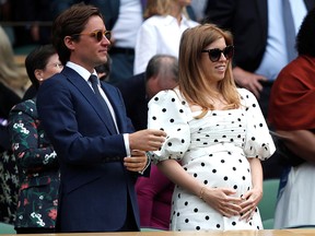 Britain's Princess Beatrice and her husband Edoardo Mapelli Mozzi in the royal box on centre court at Wimbledon.