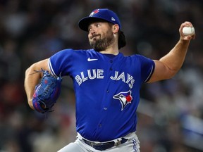 Blue Jays pitcher Robbie Ray delivers a pitch to the plate against the Twins in the second inning at Target Field in Minneapolis, Sept. 25, 2021.