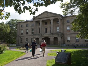 Tourists visit Province House in Charlottetown. Andrew Vaughan/THE CANADIAN PRESS