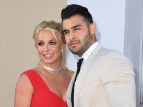 In this file photo taken on July 22, 2019, singer Britney Spears and boyfriend Sam Asghari arrive for the premiere of Sony Pictures' "Once Upon a Time... in Hollywood" at the TCL Chinese Theatre in Hollywood, Calif.